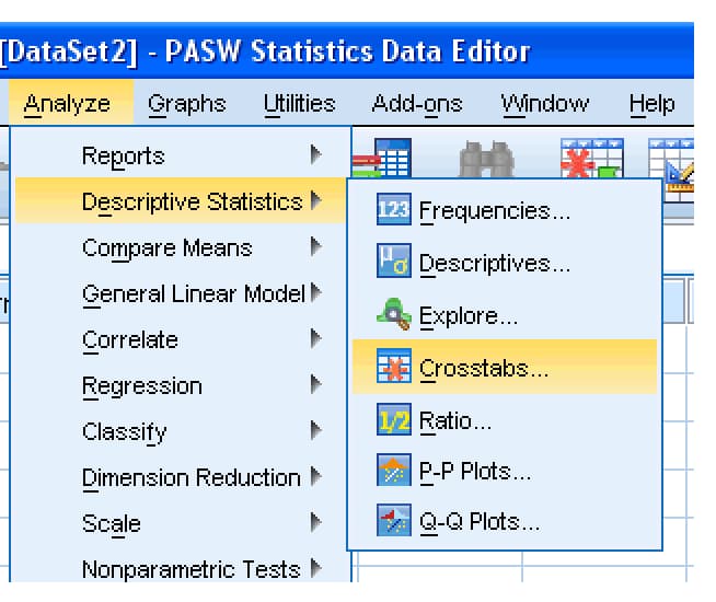 SPSS Analyze menu open at Descriptive Statistics with Crosstabs highlighted